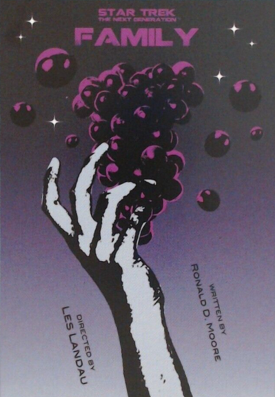 Artist: Juan Ortiz

Source: https://www.ebay.com/itm/225683073680

A poster for Star Trek The Next Generation episode Family, featuring a hand rising up to grasp grapes, against a purple background.