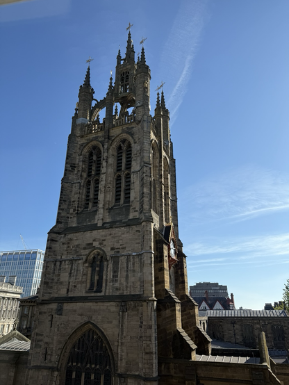 A blue sky with the lantern arch of St Nicholas Cathedral in Newcastle upon Tyne. The cathedral is over 900 years old, and the open lantern tower or ‘crown’ of the structure originally served as a beacon to guide ships in down the famous River Tyne. It’s a rare surviving example of this architecture.