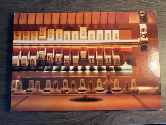 Photo of the box for Aphex Twin's drukqs album, in NEAR MINT condition what the actual fuck