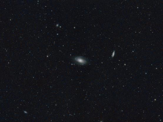 M81 and M82 , with other multiple small nebulae visible on a dark sky full of stars