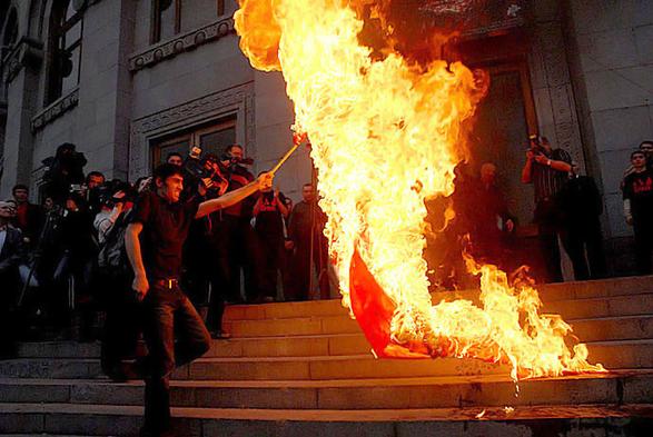 Members of the youth wing of the nationalist Armenian Revolutionary Federation – Dasnaktsutyun burn the Turkish flag in central Yerevan on the eve of 24 April. Photo: Onnik James Krikorian 2008.