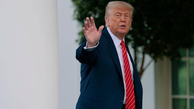Donald Trump speaks to reporters outside the West Wing of the White House on May 8, 2025