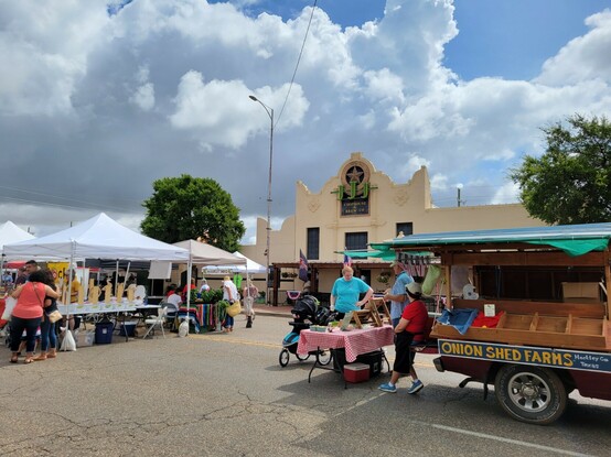 A farmer's market in the street.