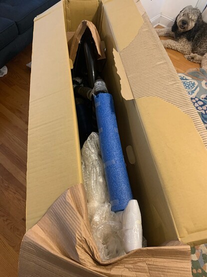 Bicycle in cardboard box