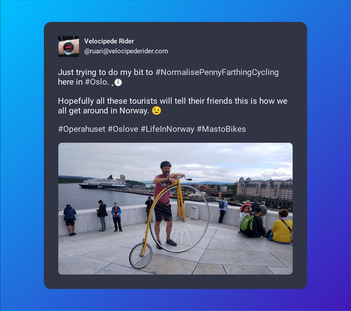 A screenshot of post by Velocipede Rider (@ruari@velocipederider.com) beautified by Mastopoet tool. It was posted on Aug 4, 2023.

Just trying to do my bit to #NormalisePennyFarthingCycling here in #Oslo. 

Hopefully all these tourists will tell their friends this is how we all get around in Norway. 😉

#Operahuset #Oslove #LifeInNorway #MastoBikes

Post has one attachment. The attachments alt text is:
Man looking at the camera standing behind a large, yellow penny farthing bicycle on top of the…