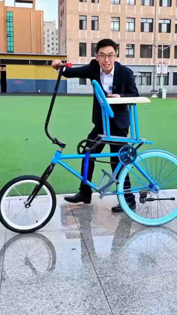 Man rides a bike that is powered by the entire seat moving up and down.