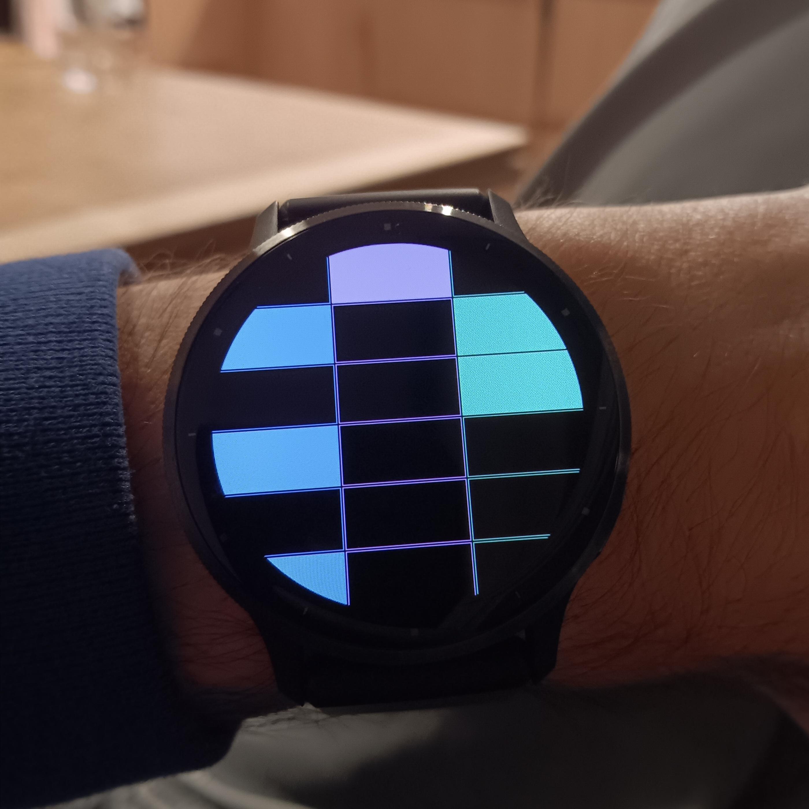 Binary watch showing 21:32 on the 24th