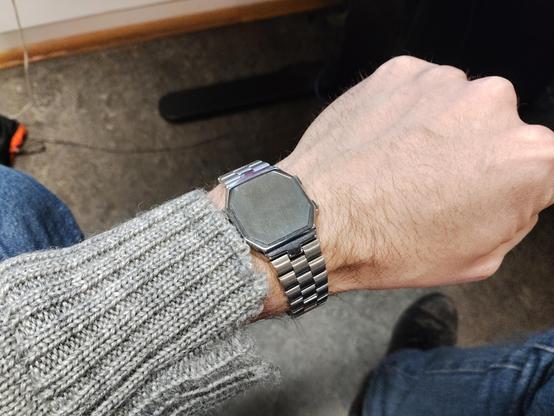 A watch with no way to display time. The face is just a block of metal.