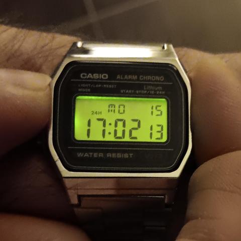 Casio A158W with a green backlight, evenly spread across the face. 