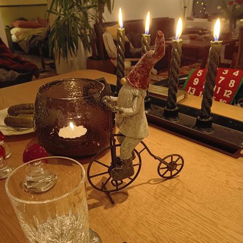 A Santa on a penny farthing decoration. 