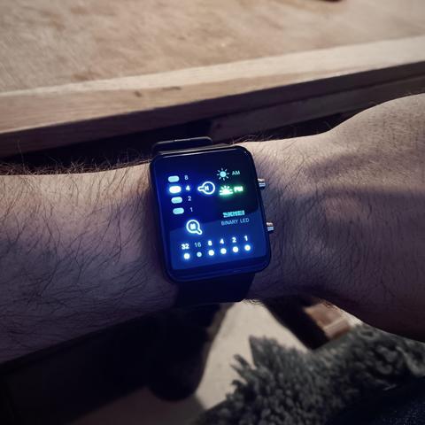 Binary watch showing 4:47pm