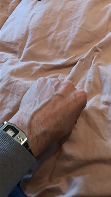 hand rotates into place and the middle finger is raised to reveal a ring watch