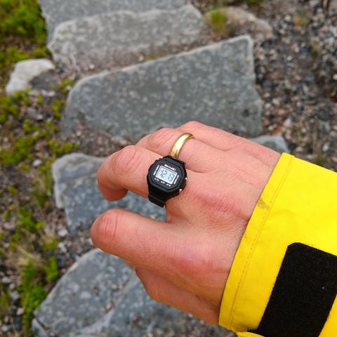Ring watch showing 12:13