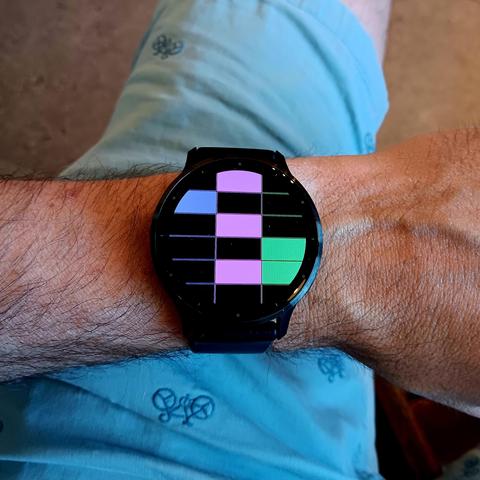 Garmin watch showing the time and date of the month in binary. 

16:42 on the 6th (of July), represented as coloured boxes in binary. 