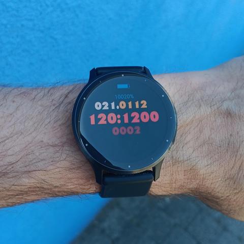 Watch showing 15:45 encoded in ternary as 120:1200.