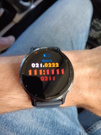 Watch with ternary display. The main hours and minutes show as 111:1111