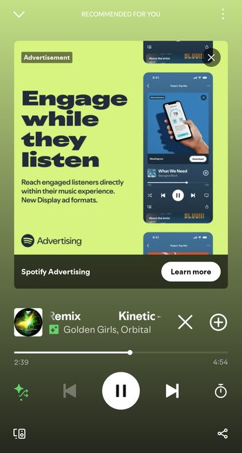 Screenshot of the Spotify mobile app's full screen player. An ad for Spotify Advertising is placed where the cover art is meant to be.