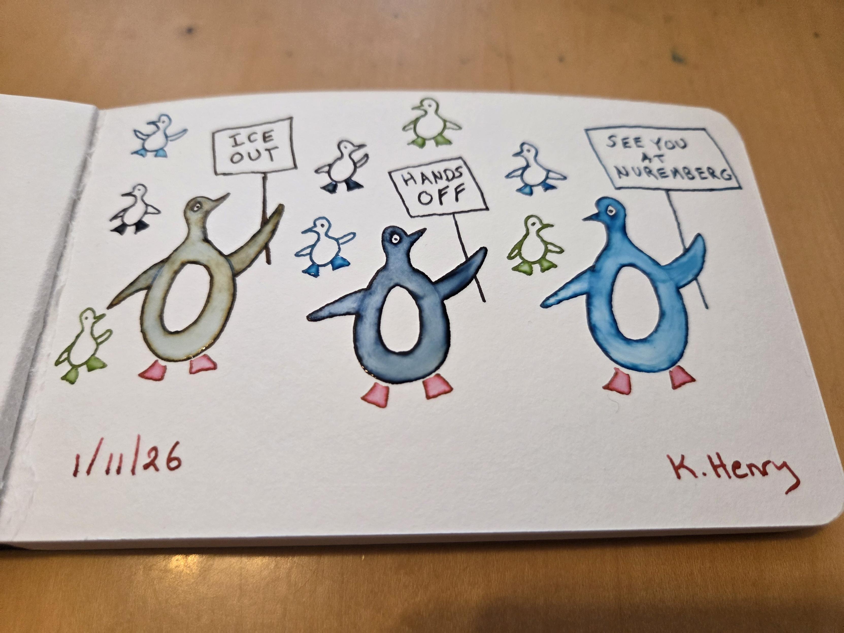 Hand drawn generative/procedural art in ink on an open page of my sketchbook. The abstract pattern looks like penguins of different colors holding up protest signs that read "Ice out", "Hands off", and "See you at Nuremburg". There are baby penguins behind the grown up penguins.