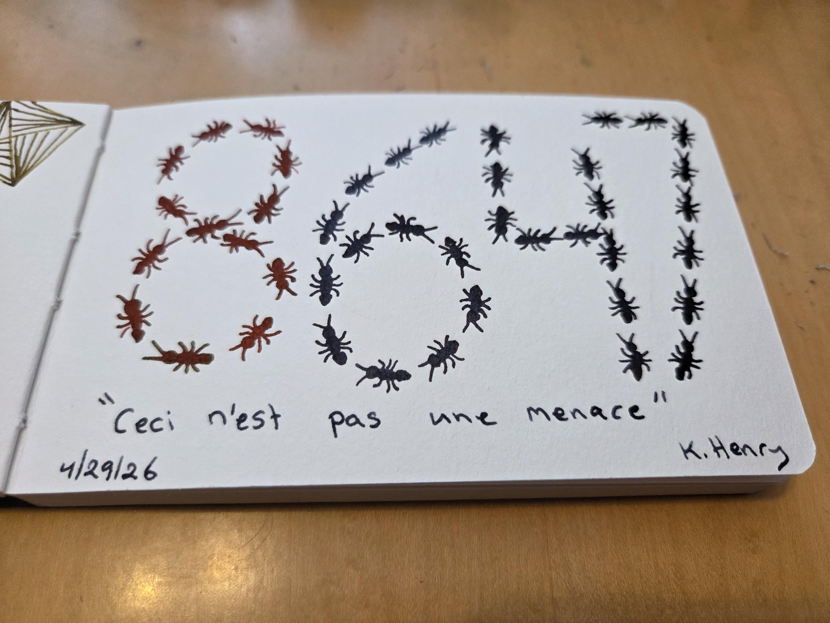 hand drawn generative/procedural art in ink on an open page of my sketchbook. The abstract pattern looks like ants have lined up to draw the numbers "8647". Below the pattern is written "Ceci n'est pas une menace", which translates to "This is not a threat".