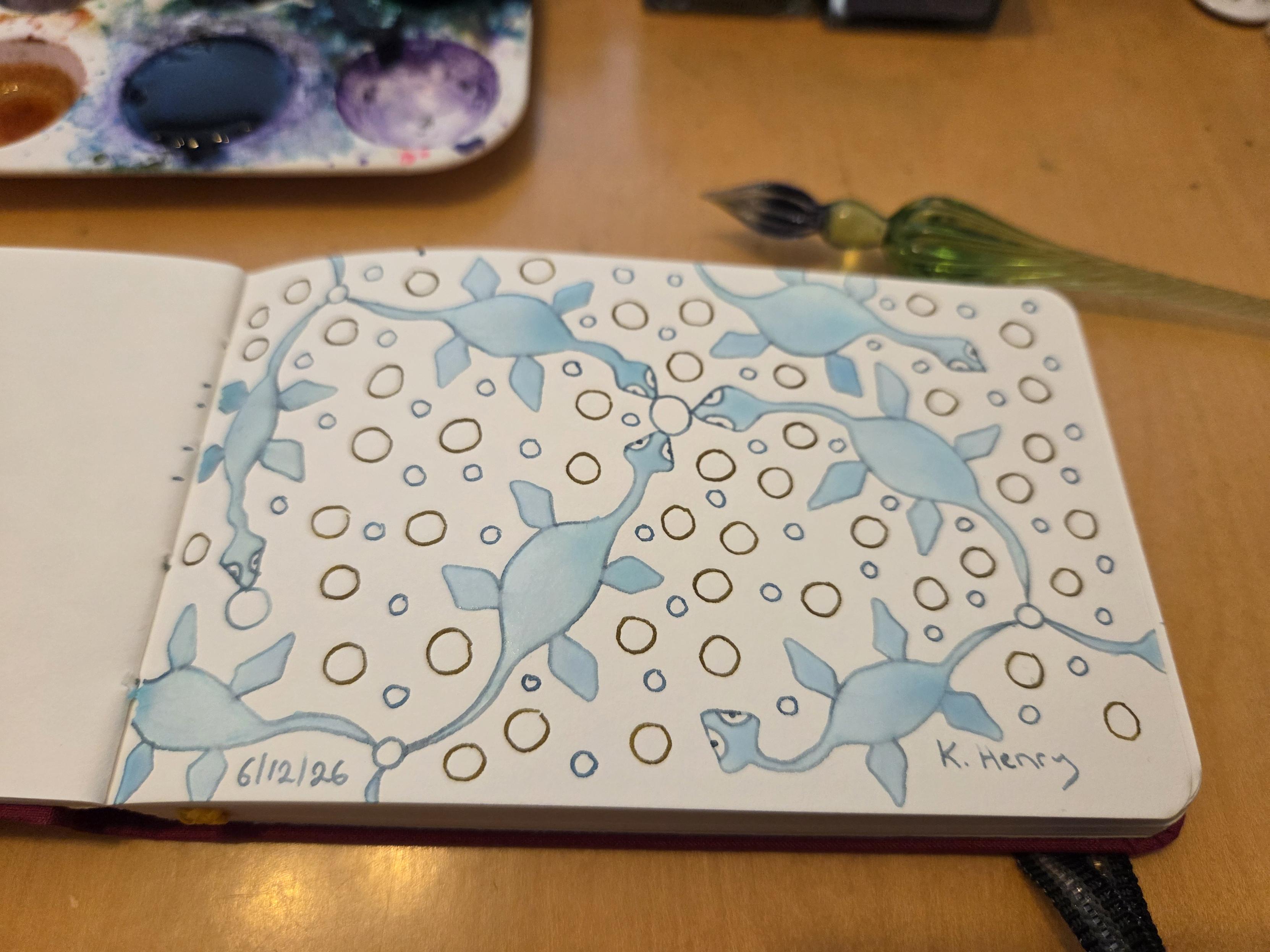 Hand drawn generative/procedural art in ink on an open page of my sketchbook. The abstract pattern looks a bit like a network of Plesiosaur shapes and bubbles.