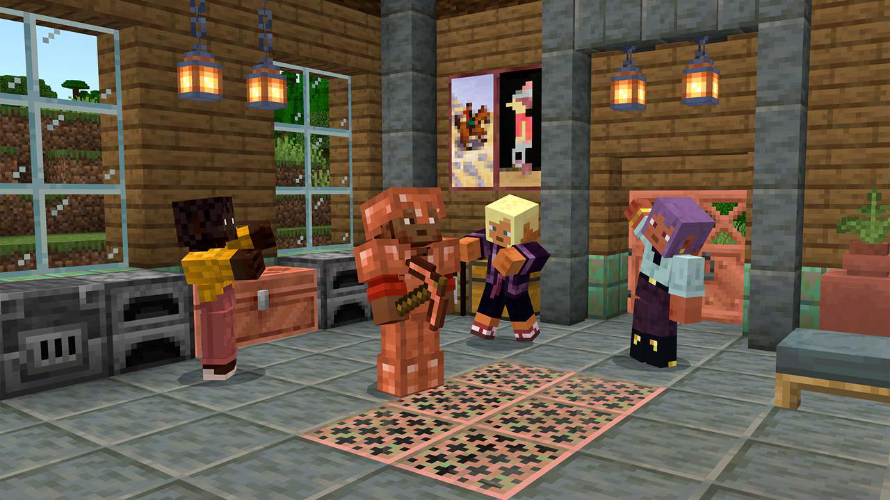 A screenshot of four player characters inside a base. One of them is wearing full copper armor and holding a copper pickaxe.