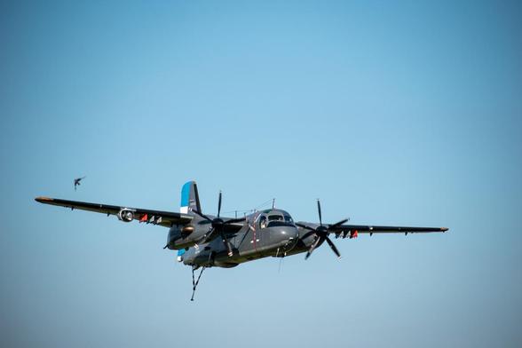 S-2 Turbo Tracker of the Argentine Navy during a low pass. The aircraft has it hook down