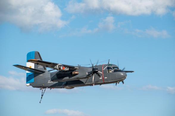 S-2 Turbo Tracker of the Argentine Navy during a low pass. The aircraft has it hook down