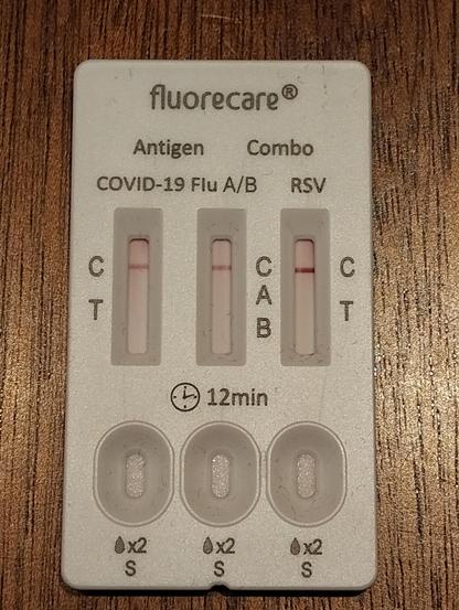 photo of a combined lateral flow test for covid, flu A/B and RSV (all negative)