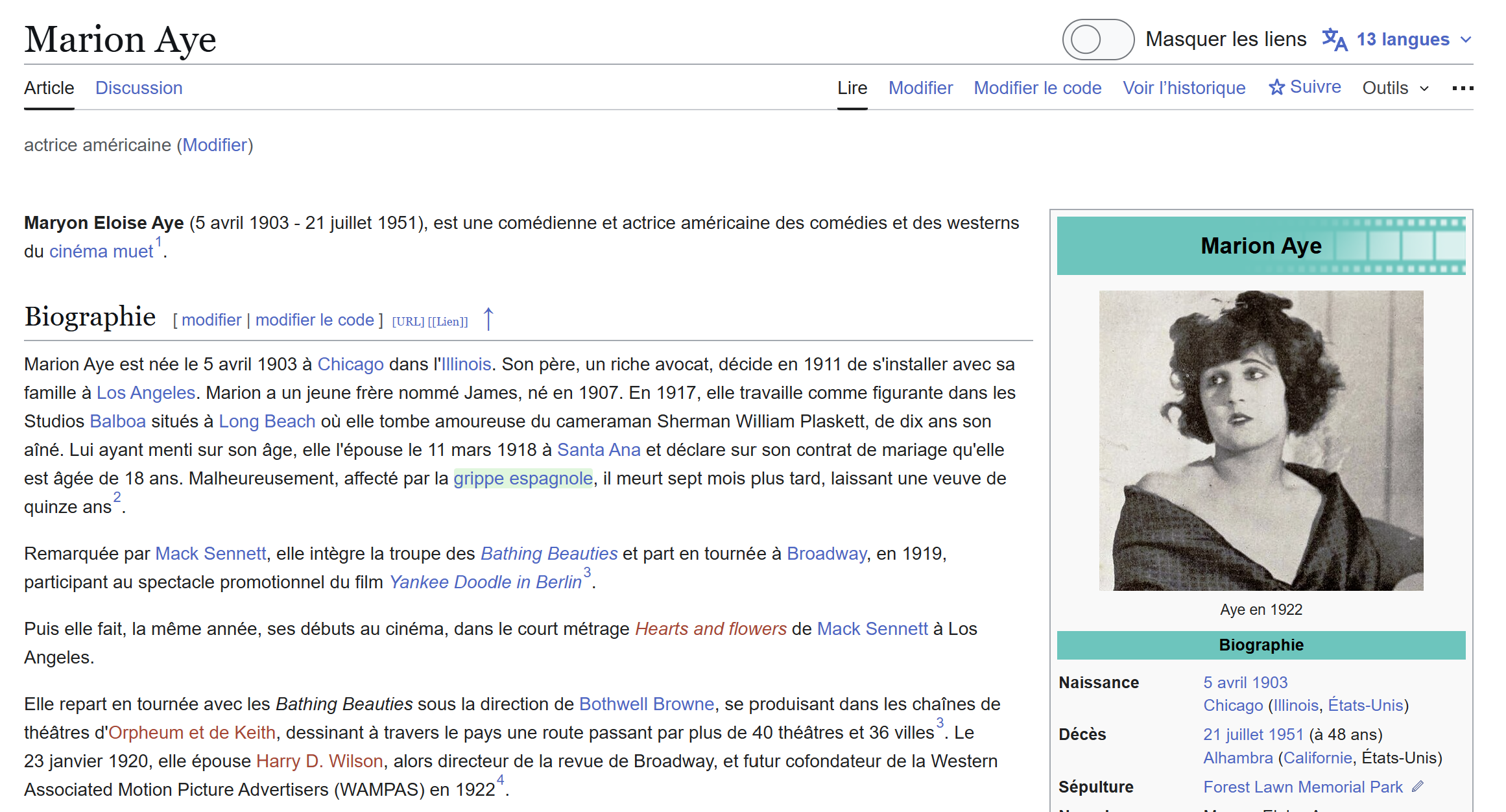 Capture d'écran de l'article Wikipédia en français de l'actrice américaine du cinéma muet Marion Aye. Le texte présente l'introduction et le début de sa biographie, évoquant sa naissance à Chicago en 1903, ses débuts de figurante et ses premiers mariages. À droite, un encadré biographique affiche un portrait d'elle en noir et blanc datant de 1922, ainsi que ses dates et lieux de naissance et de décès.