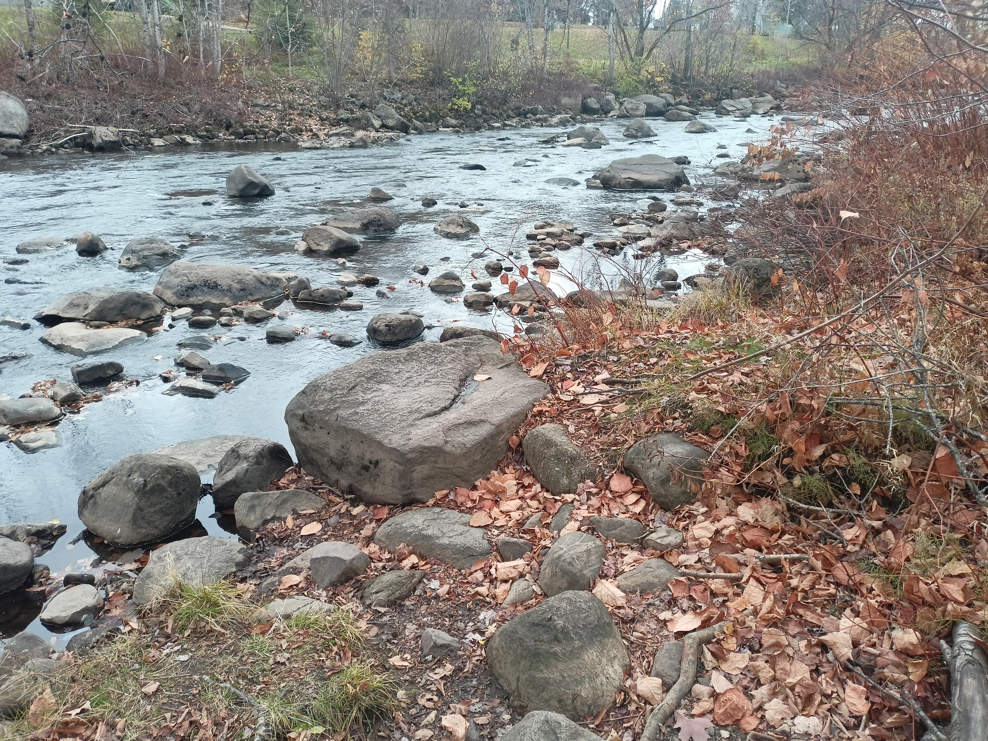Peaceful river in a peaceful blue-gray, in the gall landscape by the museum.