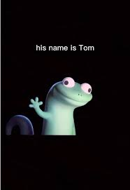 Tom Lizard from the movie "Hoppers". He's a smiling, wall-eyed green lizard.