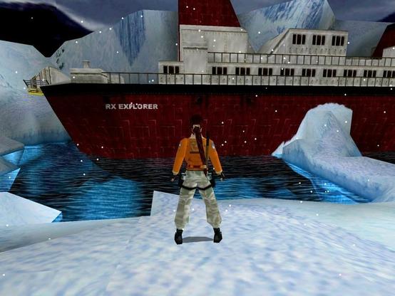 Lara Croft stands on a snowy ice shelf in front of a large red and white ship labeled "RX Explorer." She wears a bright orange winter jacket and white snow pants. Snow is gently falling, and icy cliffs and dark water surround the area.