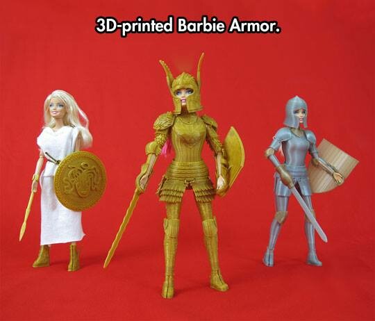 Barbie in a full plate set, golden, with resplendent, winged helmet. The armour includes a clip-on shield and a WitchBlade style sword.

Another set includes a Greek shield and spear combination.

The last set is a practical, steel-effect version of the first, with a plain helmet, sword and shield.
