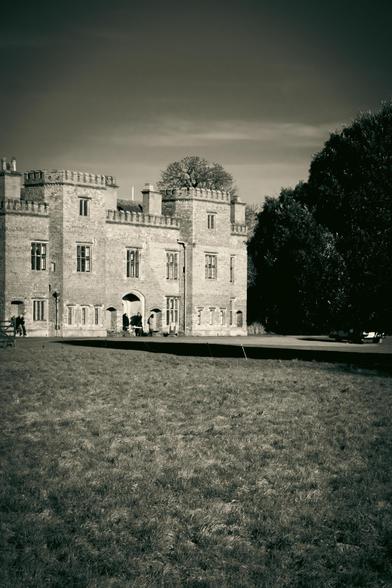 View across the lawn of a stately home.