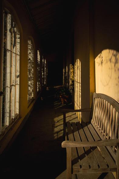 Corridor with a bench; play with shadow and sunlight.