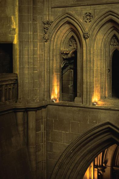 Cathedral interior: detail of masonry and arched windows.