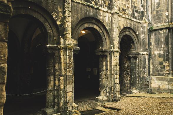 Stone gothic arches in the cathedral courtyard